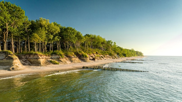 Baltic Sea and empty beach in summer at sunset