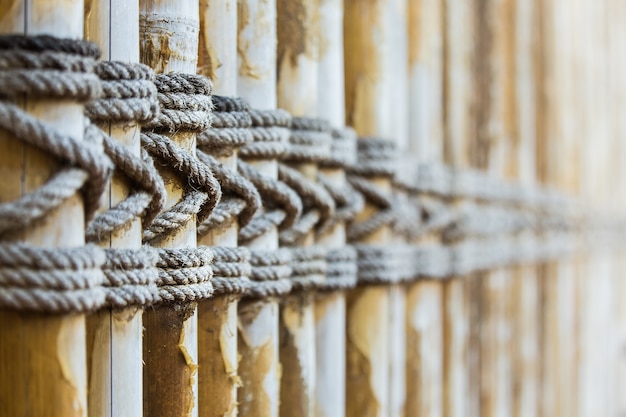 Photo bamboo panel with a rope tied.