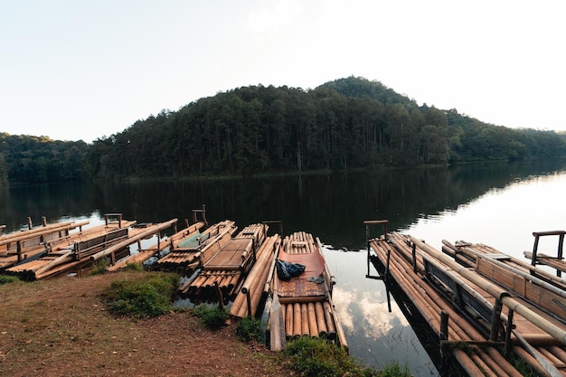 Bamboo raft pier by the river in the evening nature