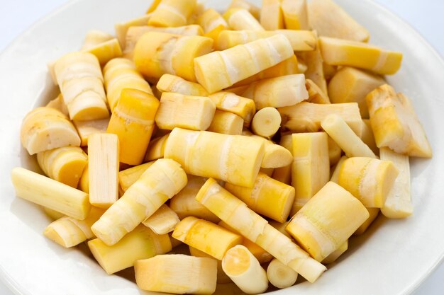 Bamboo shoots on white background.