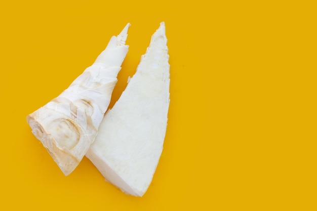 Bamboo shoots on yellow background