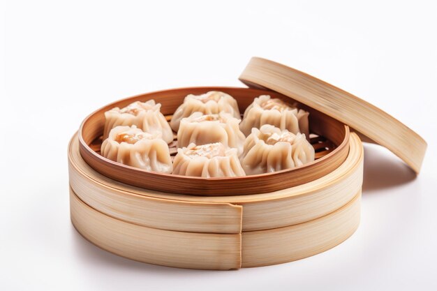 Bamboo steamer filled with chinese dim sum dumplings on white background