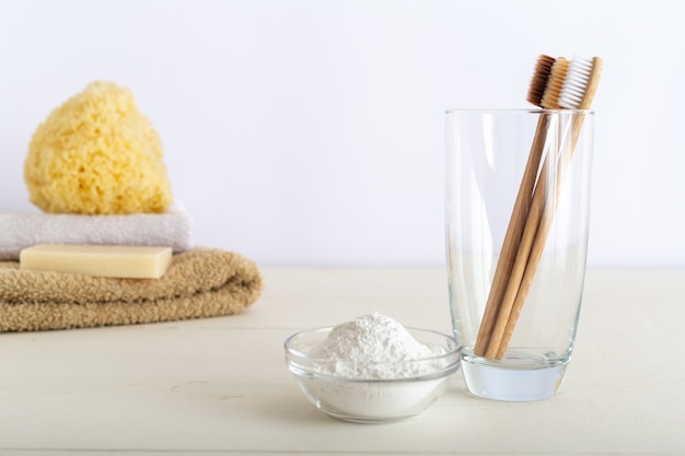 Bamboo toothbrushes in glass