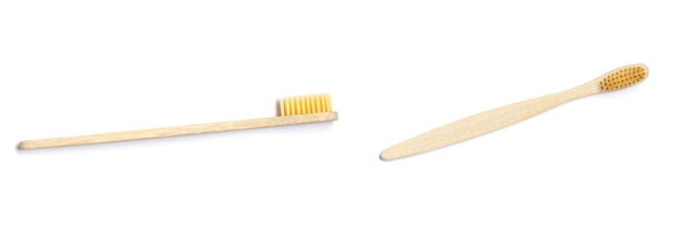 Bamboo toothbrushes on white background. Dental care