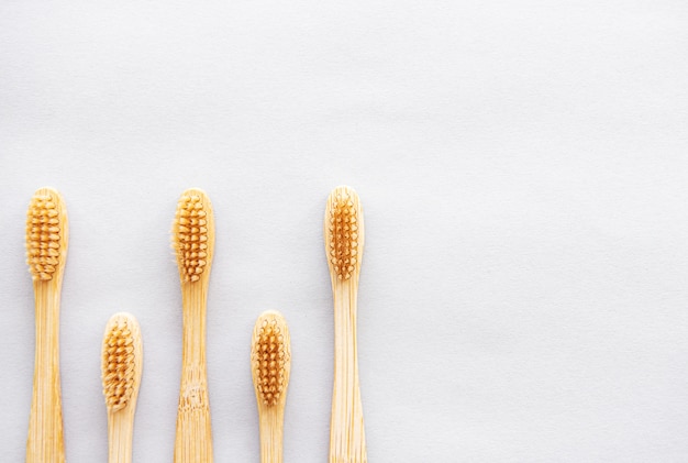 Bamboo toothbrushes with white copyspace