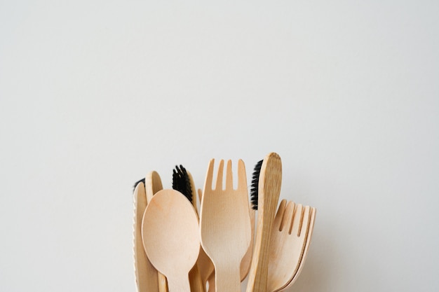 Bamboo wooden cutlery set on white background