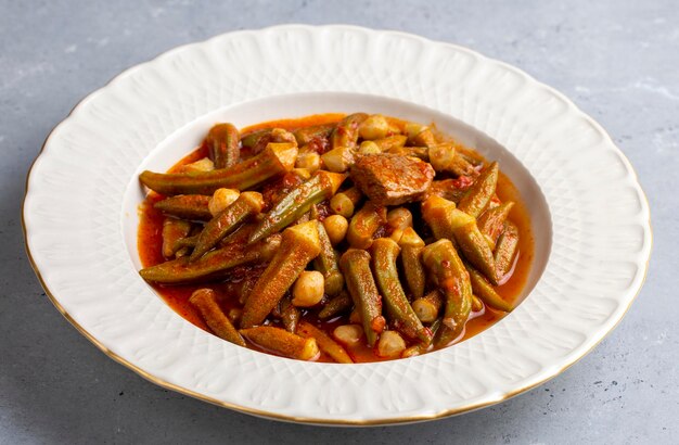 Bamya, Turkish traditional food. (Turkish cuisine) Homemade Food Okra in Plate. Organic Food.