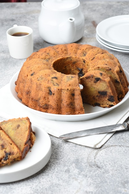 banana bundt cake on white background