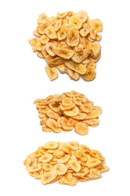 Banana chips isolated on a white background Dehydrated banana slices