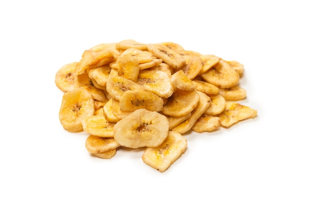 Banana chips isolated on a white background. Dehydrated banana slices.