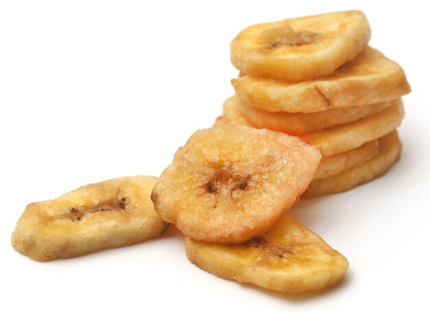 Banana chips isolated over white background