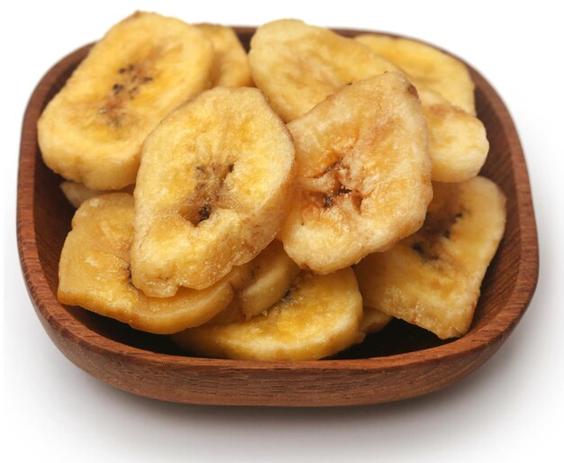 Banana chips isolated over white background