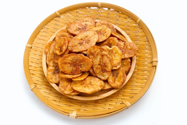 Banana chips on white background