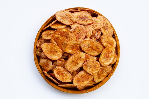 Banana chips on white background