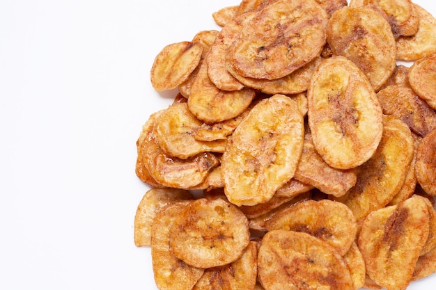 Banana chips on white background