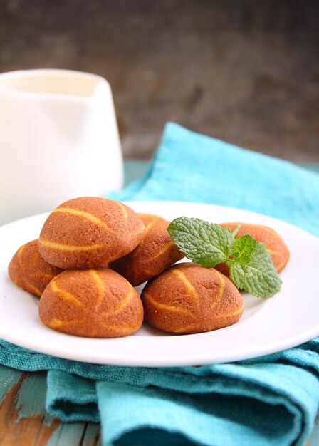 Banana chocolate cookies decorated with mint on a plate