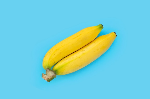 Banana fruit on blue background.