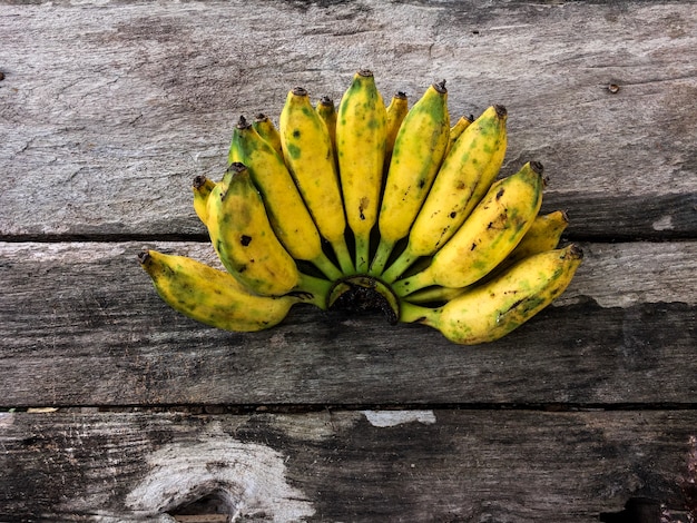 Banana on old wooden background