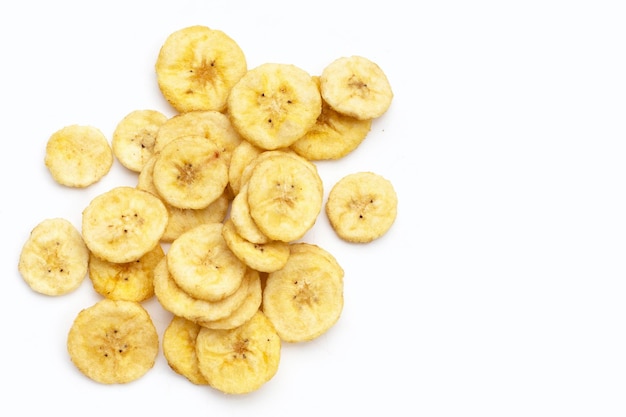 Photo banana slice chips on white background