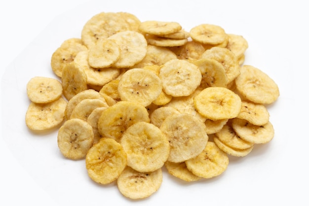 Photo banana slice chips on white background