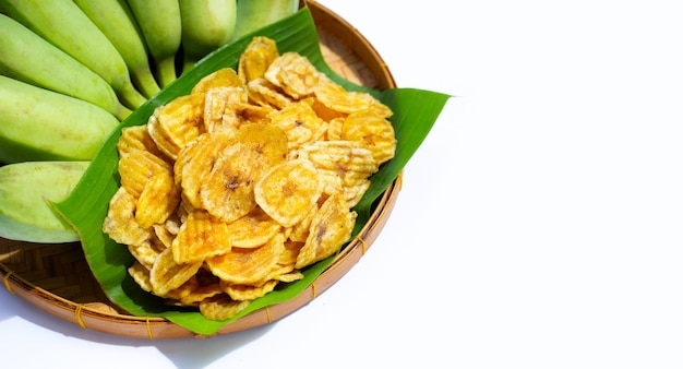 Banana slice chips on white background