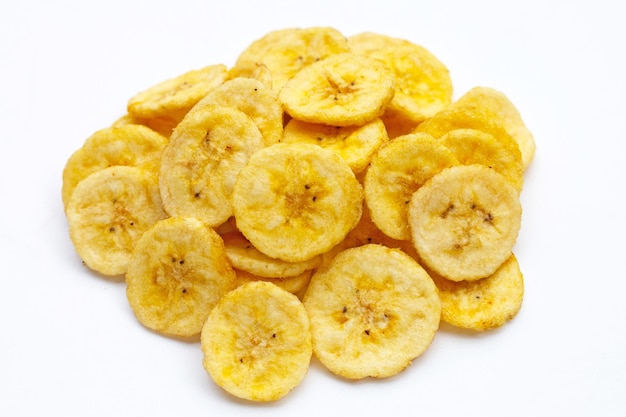 Banana slice chips on white background