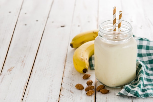 Banana smoothie with almond in jar