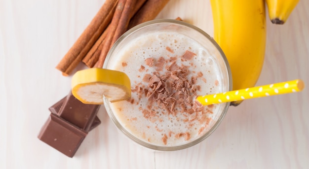 Banana Smoothie on a wooden table. 