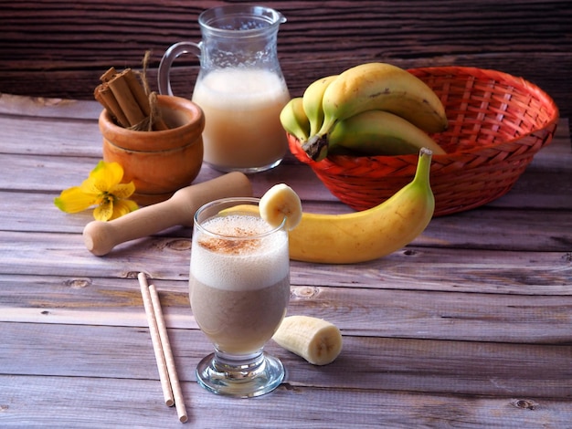 Banana smoothie on a wooden table