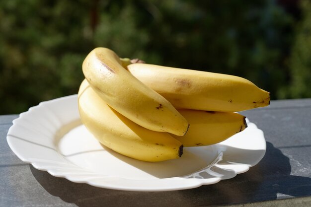 banana on white plate