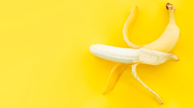 Banana with peel opened