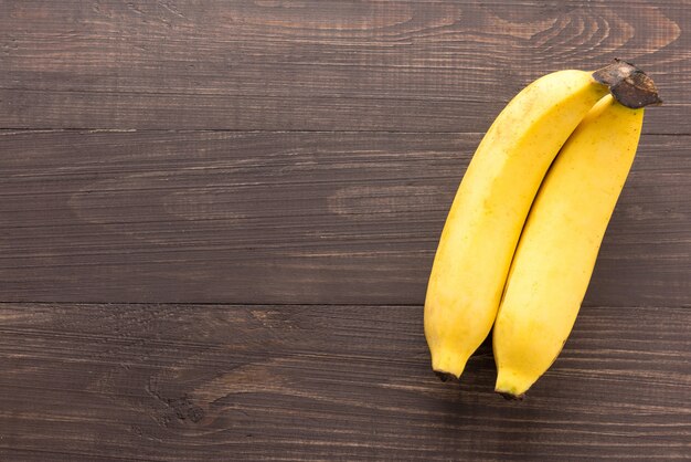 Banana on the wooden background. Top view