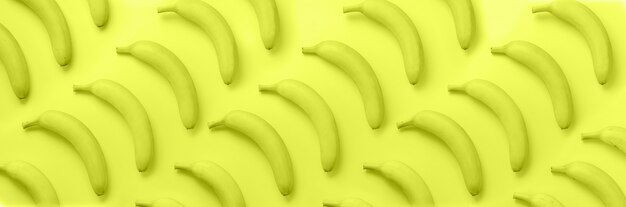 Bananas over neon yellow pattern