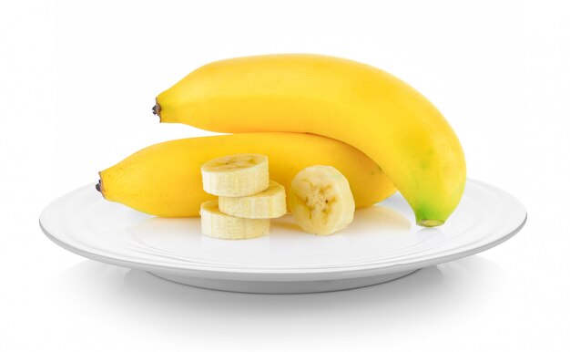 Bananas in plate on white space