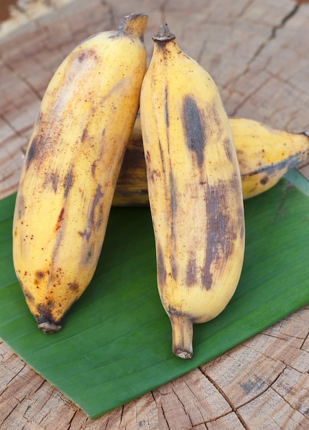 Bananas on a wood table.