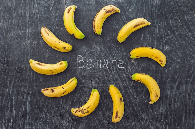 Bananas on a wooden background