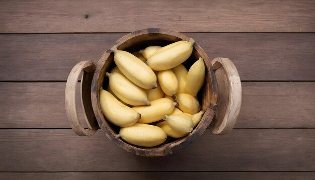 Bananas in a wooden bucket On a wooden background