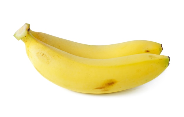 Bananen die op witte achtergrond worden geïsoleerd