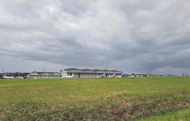 Photo bandung indonesia november 5 2023 several aircrafts parked outer the hangar at bandung airport