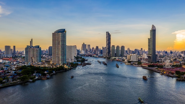 Bangkok city skyline and skyscraper with business building in Bangkok downtown, Chao Phraya River, Bangkok, Thailand.