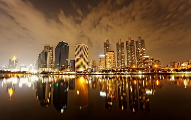 Bangkok in evening, reflection of buildings in water