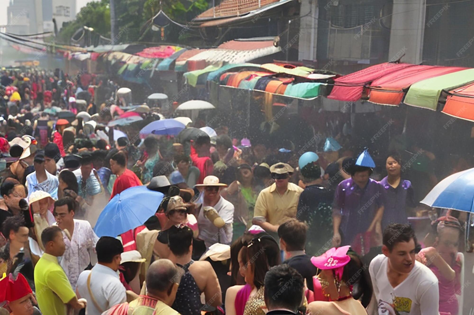 Premium Photo Bangkok Thailand April 13 2025 Crowds celebrate