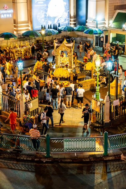 BANGKOK, THAILAND - AUG 9, 2018: Erawan Shrine on September 18. Tourists make a merit at Erawan Shrine at Ratchaprasong Junction in Bangkok.