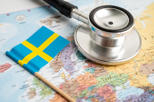 Bangkok, Thailand - June 1, 2021, Stethoscope on Sweden world globe map background.