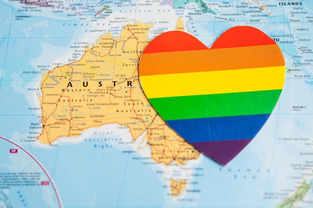 Bangkok Thailand June 1 2022 Rainbow color heart on Australia world map background symbol of LGBT pride month symbol of gay lesbian bisexual transgender human rights and peace