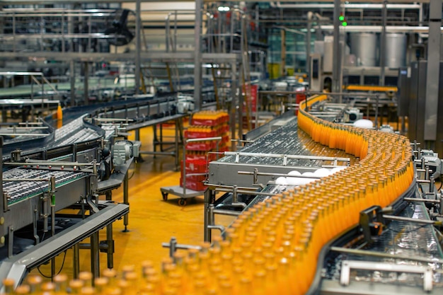 Bangkok Thailand JUNE 10th 2020 Beverage factory interior Conveyor flowing with bottles for juice or water