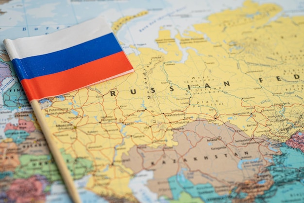 Bangkok, Thailand - October 7, 2021 Russia flag on world map background.