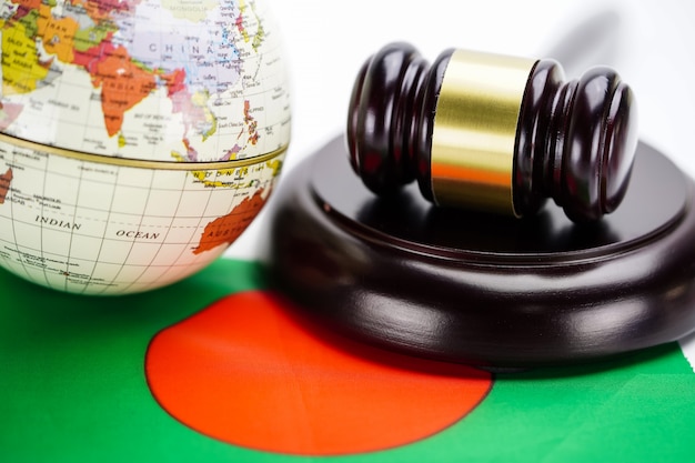 Bangladesh flag and Judge hammer with globe world map