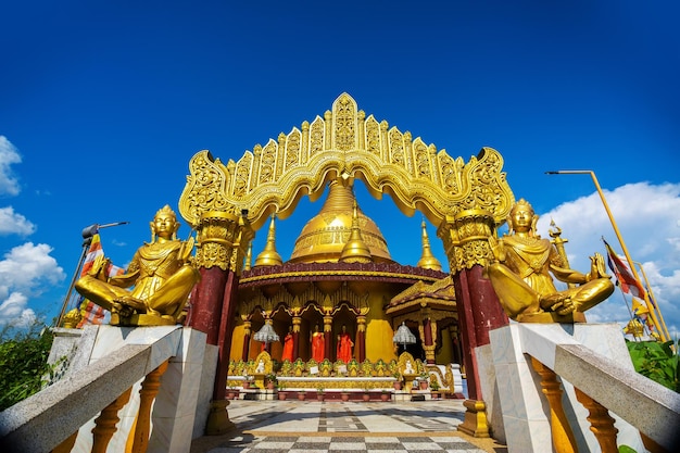 Bangladesh October 14 2019 At the entrance of the Buddha Temple is a giant Buddha gold statue at Balaghata Bandarban Bangladesh