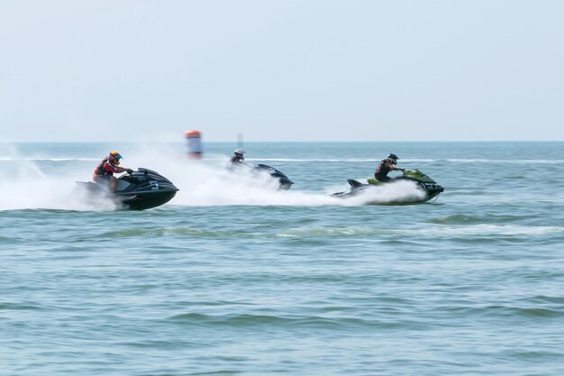 Bangsaen, thailand - jan. 18: the scooter jet ski open at the\
start line during bangsaen festival water sport 2015, on january\
18, 2015 in bangsaen, thailand.